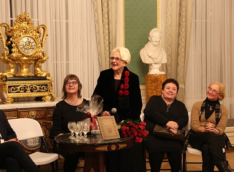 Kalėdos premija Koženiauskienei